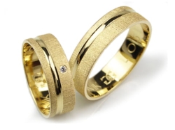 Obrączki ślubne z żółtego złota 333 płaskie z cyrkonią 6mm Lovely L015-333
