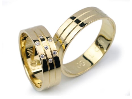 Obrączki ślubne z żółtego złota 333 płaskie z cyrkoniami 6mm Lovely L031-333