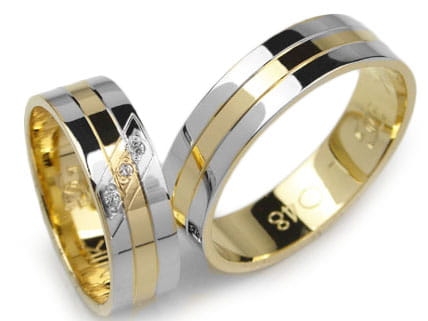 Obrączki ślubne z żółtego i rodowanego złota 333 płaskie z cyrkoniami 6mm Lovely L048-333