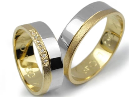 Przejdź do produktu Obrączki ślubne z żółtego złota 333 płaskie z cyrkoniami 6mm Lux L049