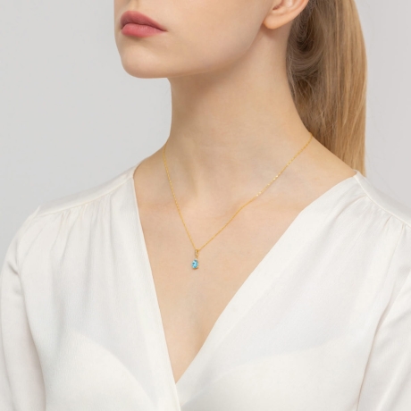 Przejdź do produktu Zawieszka z żółtego złota 585 z topazem i diamentami 0,025ct The Diamonds