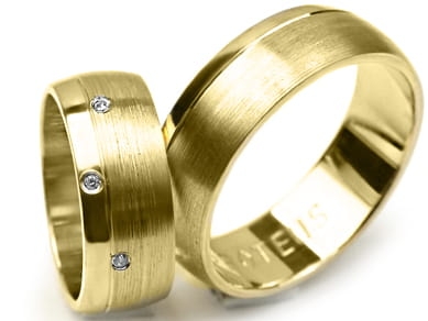 Przejdź do produktu Obrączki ślubne z żółtego złota półokrągłe z cyrkoniami 7mm Premium 