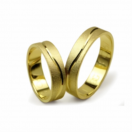 Przejdź do produktu Obrączki ślubne z żółtego złota płaskie 5mm fala Special S067