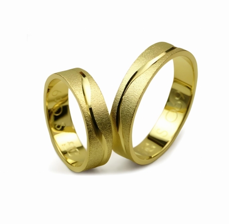 Przejdź do produktu Obrączki ślubne z żółtego złota płaskie 5mm fala Special S069
