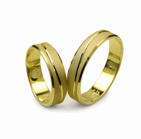 Przejdź do produktu Obrączki ślubne z żółtego złota płaskie 5mm fala Special S073