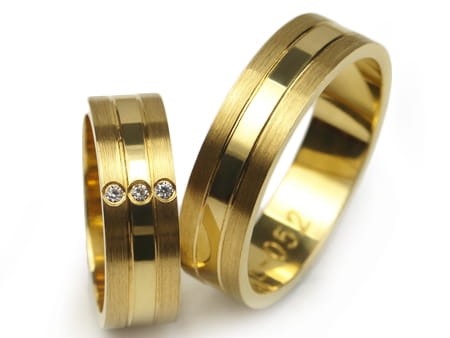 Obrączki ślubne z żółtego złota płaskie z cyrkoniami 6mm Estetic E052
