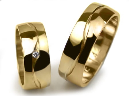 Obrączki ślubne z żółtego złota półokrągłe z cyrkonią 7mm Estetic E142