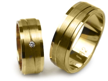 Obrączki ślubne z żółtego złota płaskie z cyrkonią 7mm Estetic E162