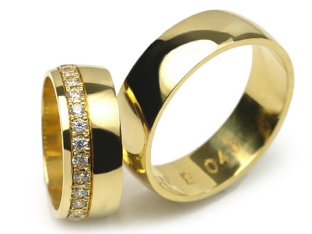 Obrączki ślubne z żółtego złota półokrągłe z cyrkoniami 7mm Estetic E046
