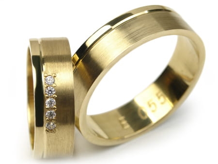 Obrączki ślubne z żółtego złota płaskie z cyrkoniami 6mm Estetic E055