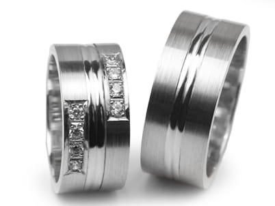 Obrączki ślubne z białego złota płaskie z cyrkoniami 9mm Estetic  E086-b