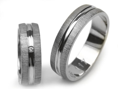 Obrączki ślubne z białego złota półokrągłe z cyrkonią 6mm Estetic  E117-b