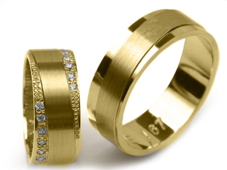 Obrączki ślubne z żółtego złota płaskie z cyrkoniami 7mm Estetic E167