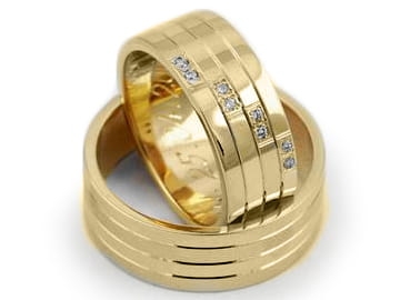 Przejdź do produktu Obrączki ślubne z żółtego złota płaskie z cyrkoniami 8mm Estetic 