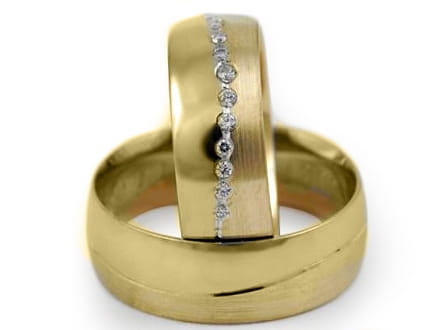 Obrączki ślubne z żółtego złota półokrągłe z cyrkoniami 7mm Estetic E296